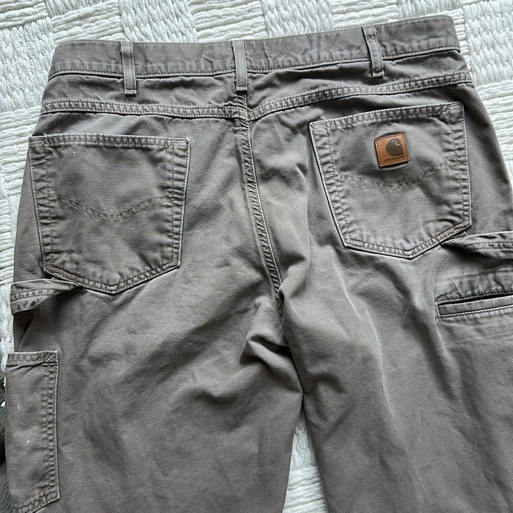 Carhartt distressed carpenter pants with some stains and holes. #10015 - Picture 7 of 11